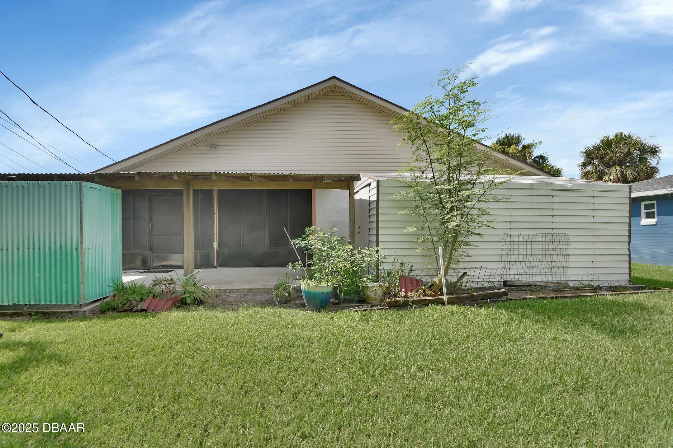 33 Rivocean Drive Ormond Beach, FL 32176 - Photo 17 of 29 a front view of house with yard and green space