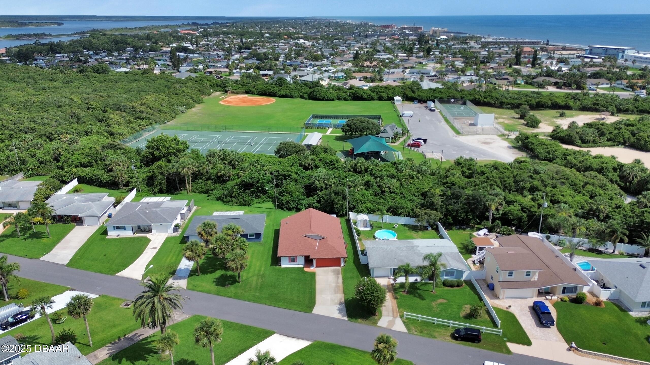 33 Rivocean Drive Ormond Beach, FL 32176 - Photo 26 of 29 an aerial view of multiple houses with yard