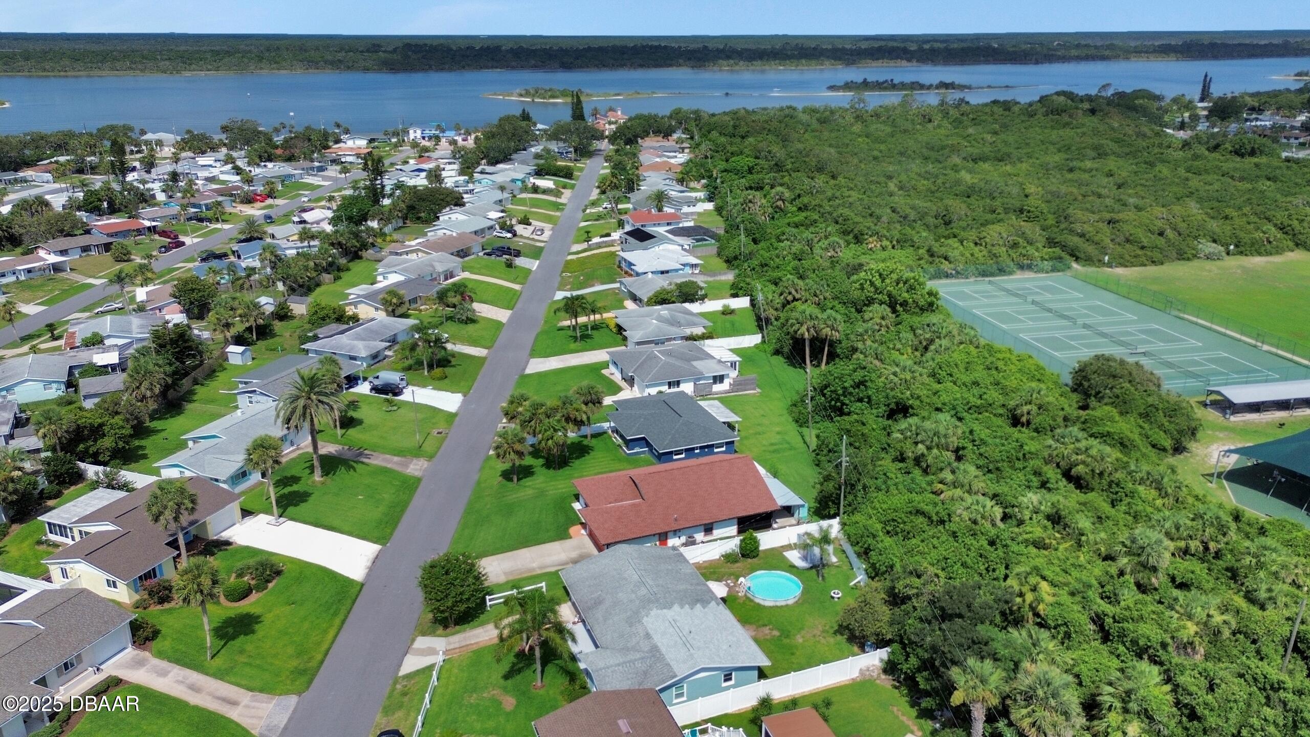 33 Rivocean Drive Ormond Beach, FL 32176 - Photo 27 of 29 an aerial view of a house with a garden