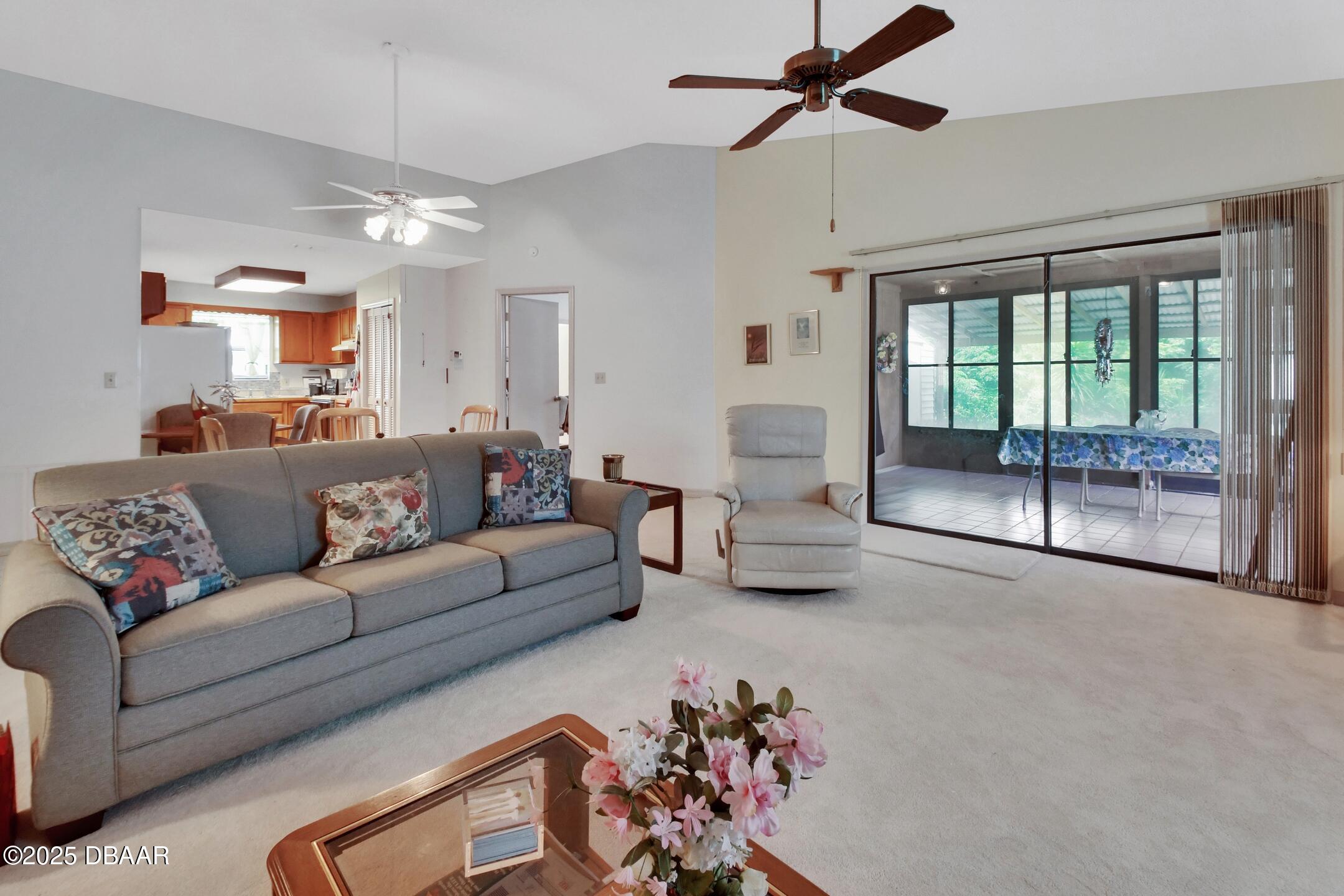 33 Rivocean Drive Ormond Beach, FL 32176 - Photo 3 of 29 a living room with furniture and a large window