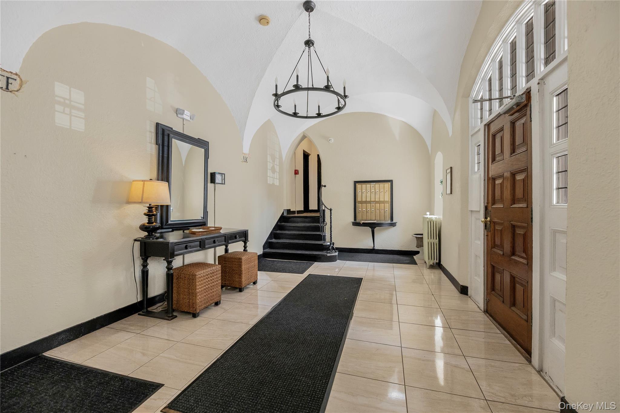 26 Pondfield Road, Unit 1D Bronxville, NY 10708 - Photo 3 of 21 a view of a hallway with seating area