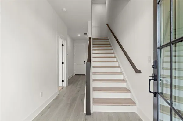 a view of an entryway with staircase