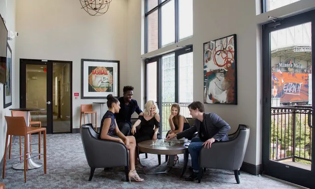 a dining room with furniture and window