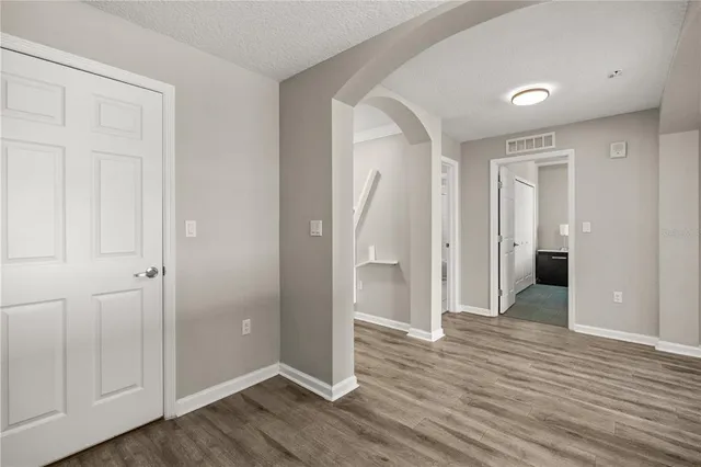 a kitchen with a sink stainless steel appliances and cabinets