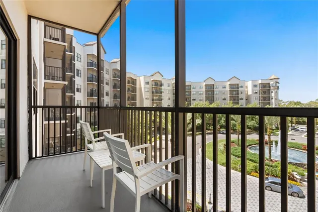 a view of a balcony with city view
