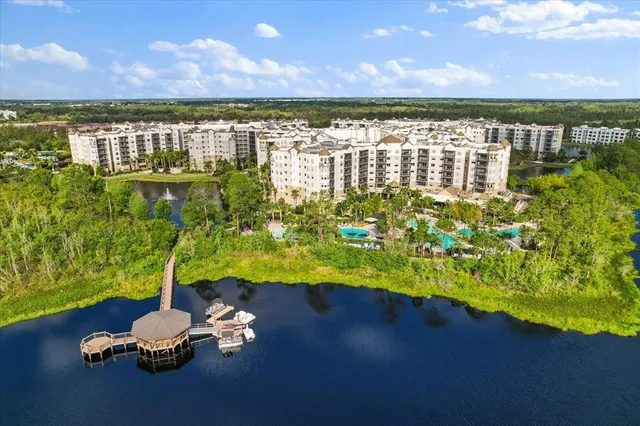 a view of lake with yard