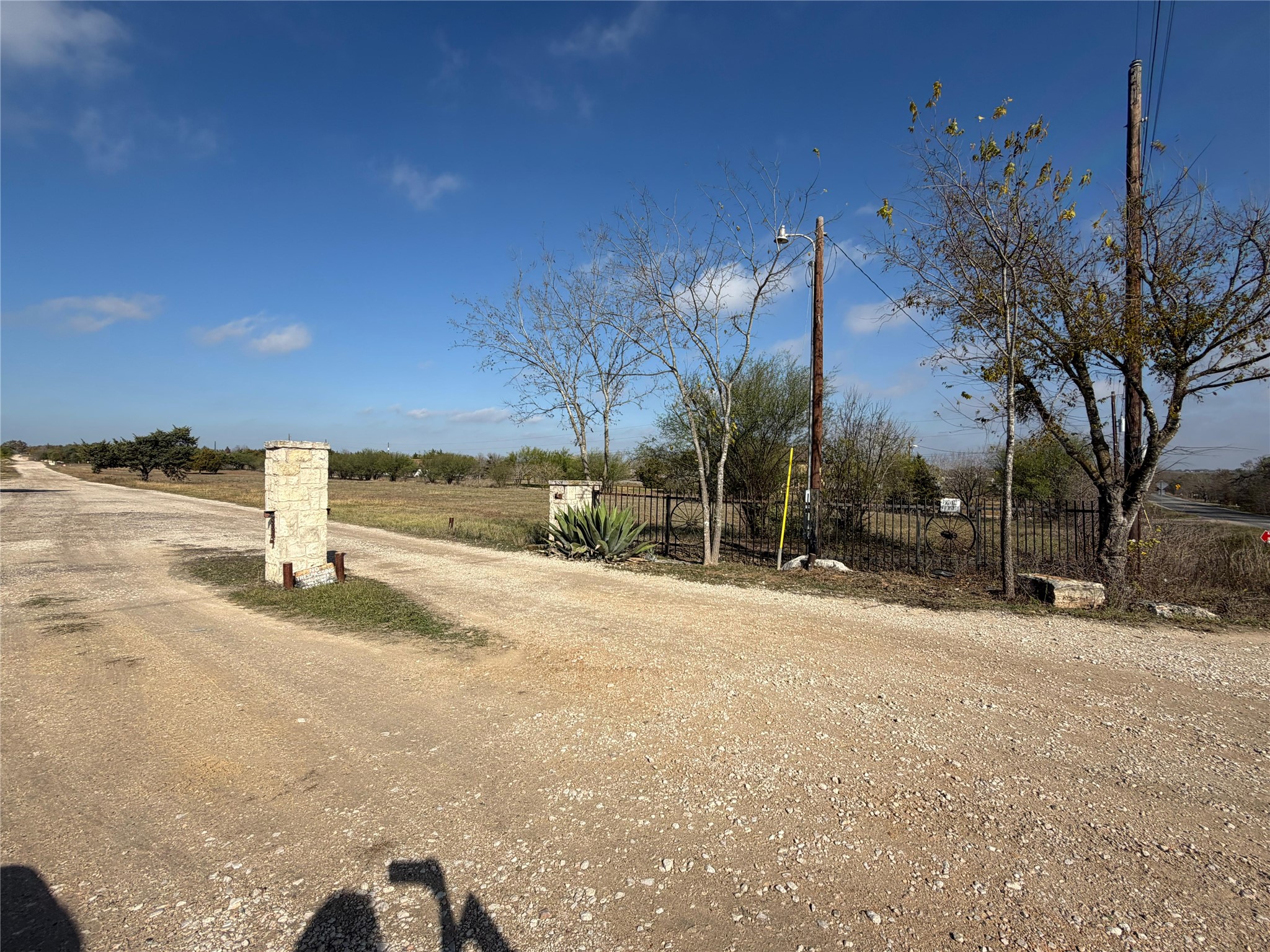 11622 A Doyle Overton Road Austin, TX 78719 - Photo 3 of 10 a pathway of a house with a yard