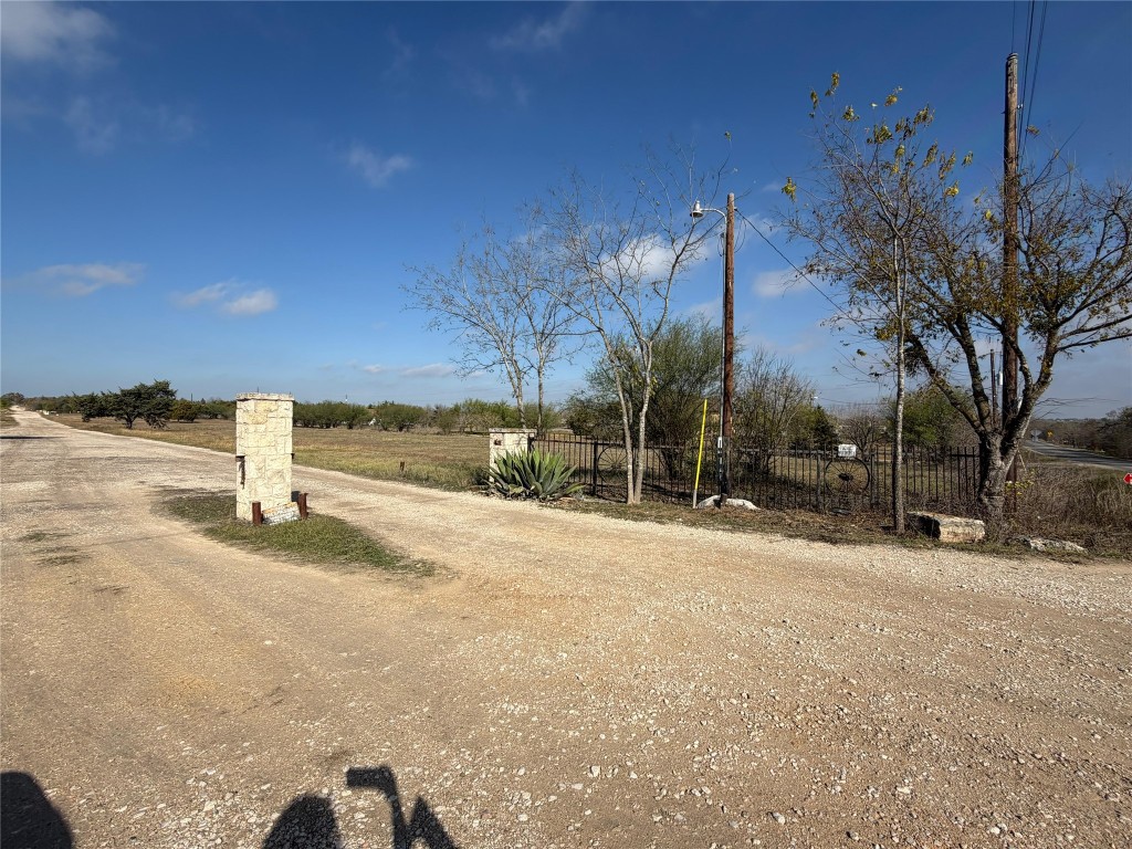 11622 A Doyle Overton Road Austin, TX 78719 - Photo 3 of 10 View of street featuring a rural view