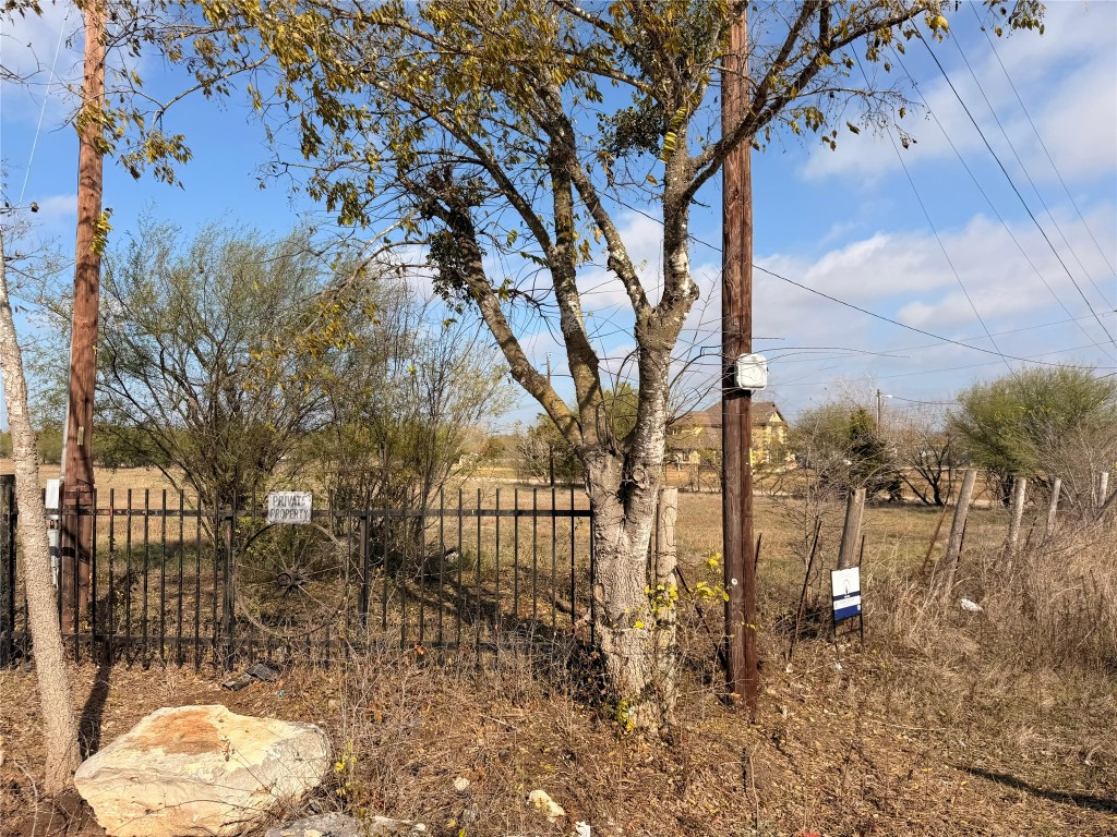 11622 A Doyle Overton Road Austin, TX 78719 - Photo 8 of 10 View of yard featuring a rural view