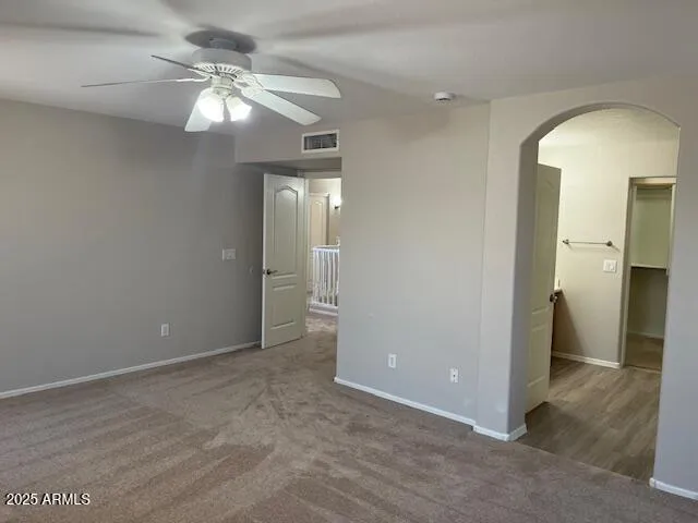 a view of an empty walk in closet