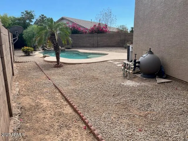a view of a back yard of the house
