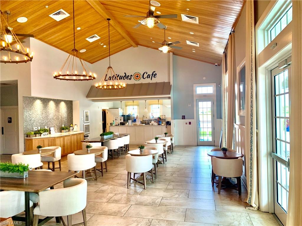 14632 Edgewater Circle Naples, FL 34114 - Photo 30 of 35 a very nice looking living room with furniture and a large window