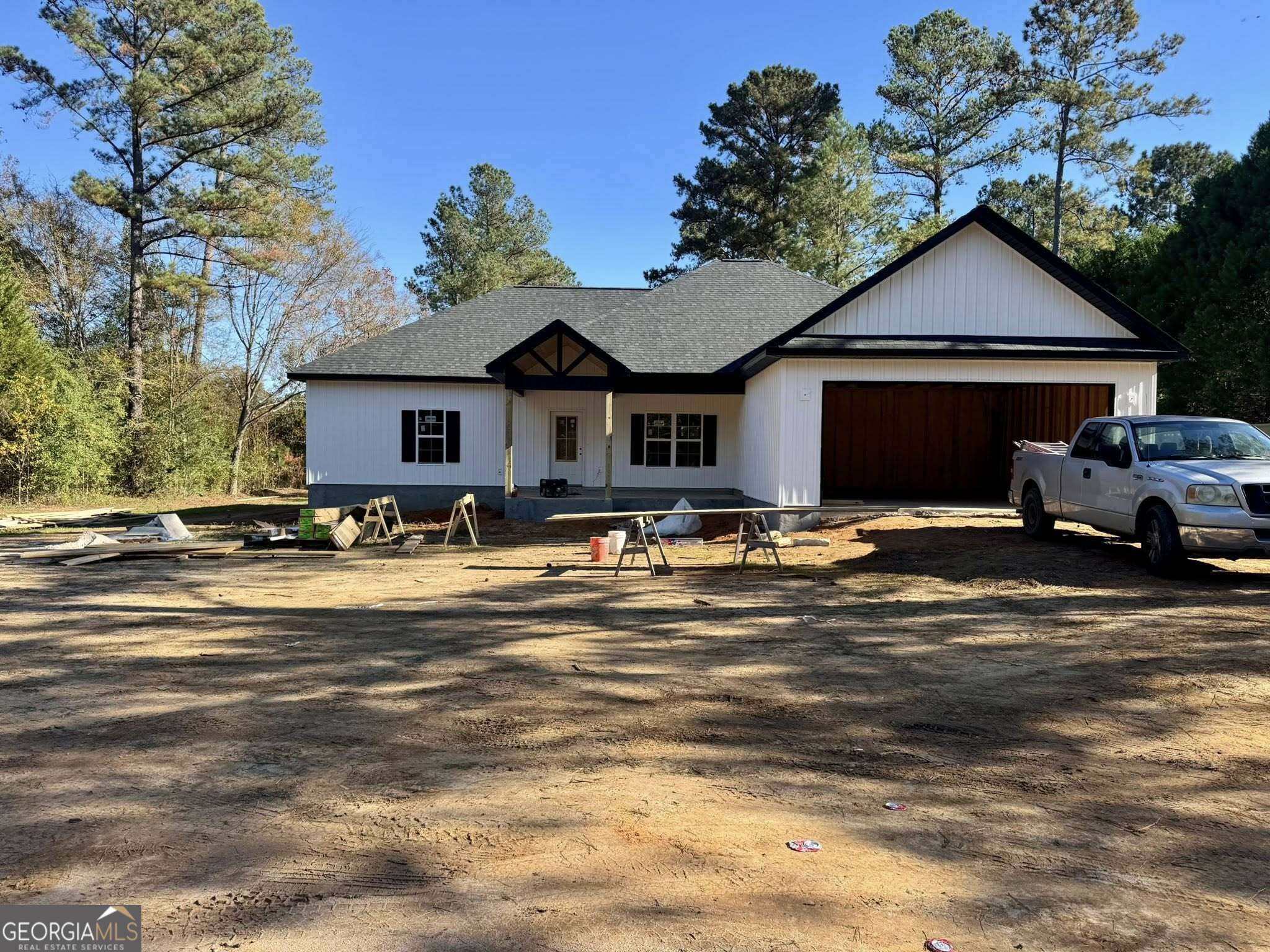 230 Woodland Heights Road Dublin, GA 31021 - Photo 2 of 30 a front view of a house with a yard