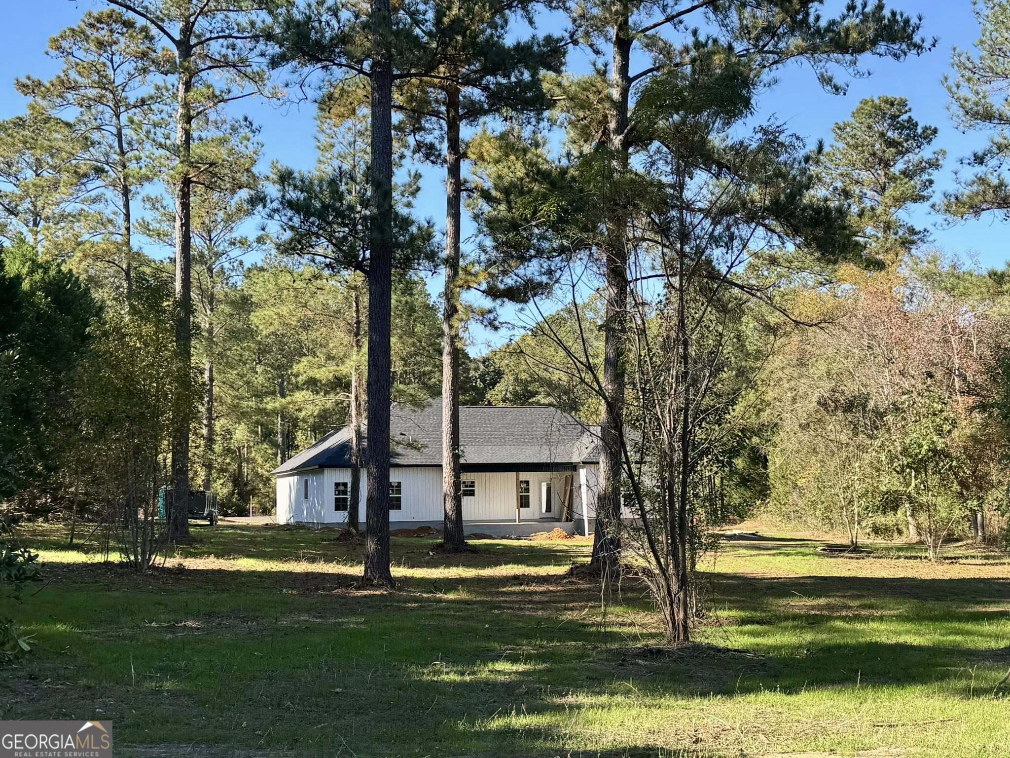 230 Woodland Heights Road Dublin, GA 31021 - Photo 29 of 30 a view of a house with a yard