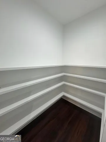 a view of small space with racks on the wall