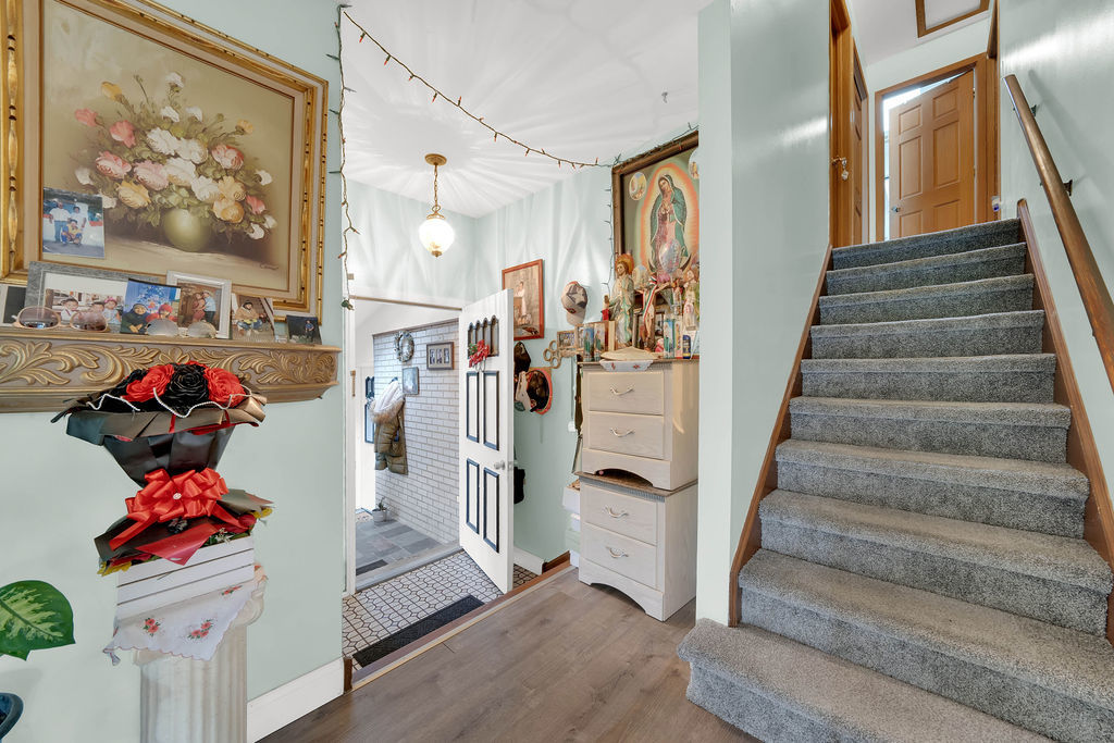 7245 West Dralle Road Monee, IL 60449 - Photo 22 of 73 a view of entryway with a front door and wooden floor