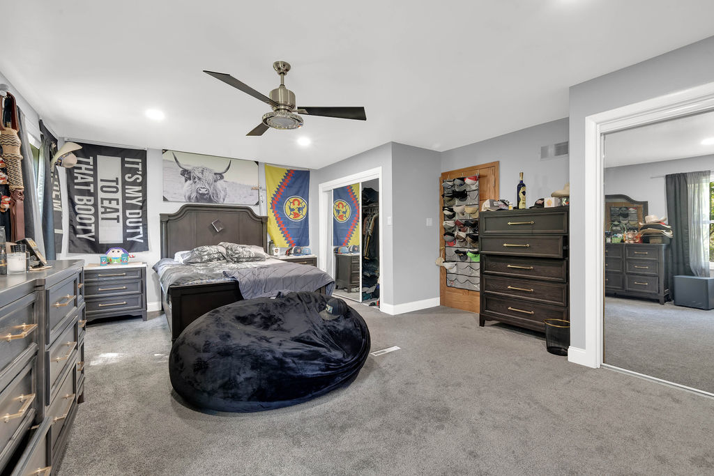 7245 West Dralle Road Monee, IL 60449 - Photo 28 of 73 a living room with furniture and a flat screen tv