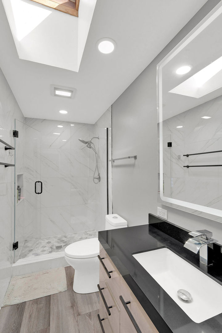 7245 West Dralle Road Monee, IL 60449 - Photo 30 of 73 a bathroom with a sink a toilet and shower