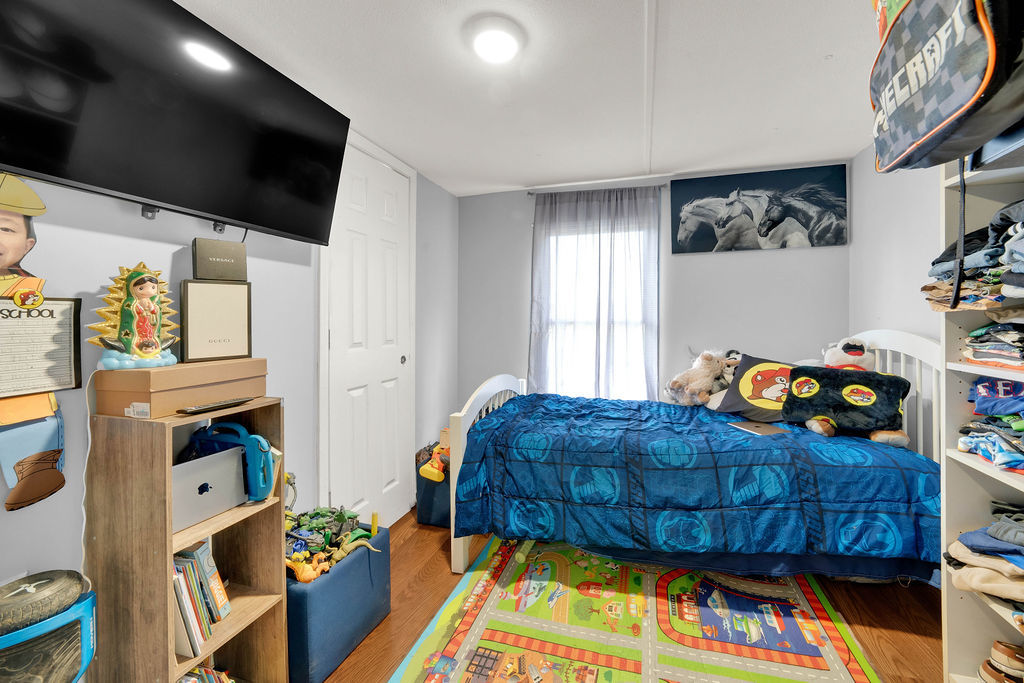 7245 West Dralle Road Monee, IL 60449 - Photo 35 of 73 a bedroom with a bed and a window