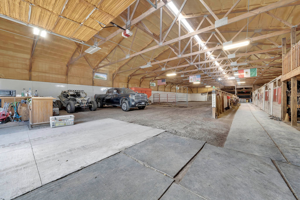 7245 West Dralle Road Monee, IL 60449 - Photo 52 of 73 a car garage with parked cars