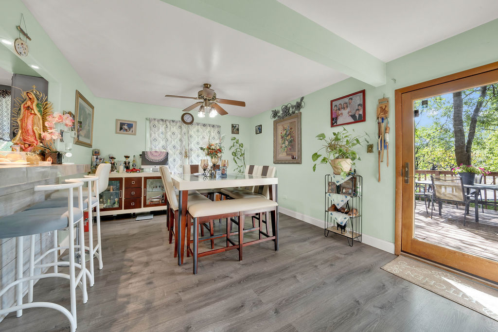 7245 West Dralle Road Monee, IL 60449 - Photo 7 of 73 a view of a dining room with furniture and chandelier