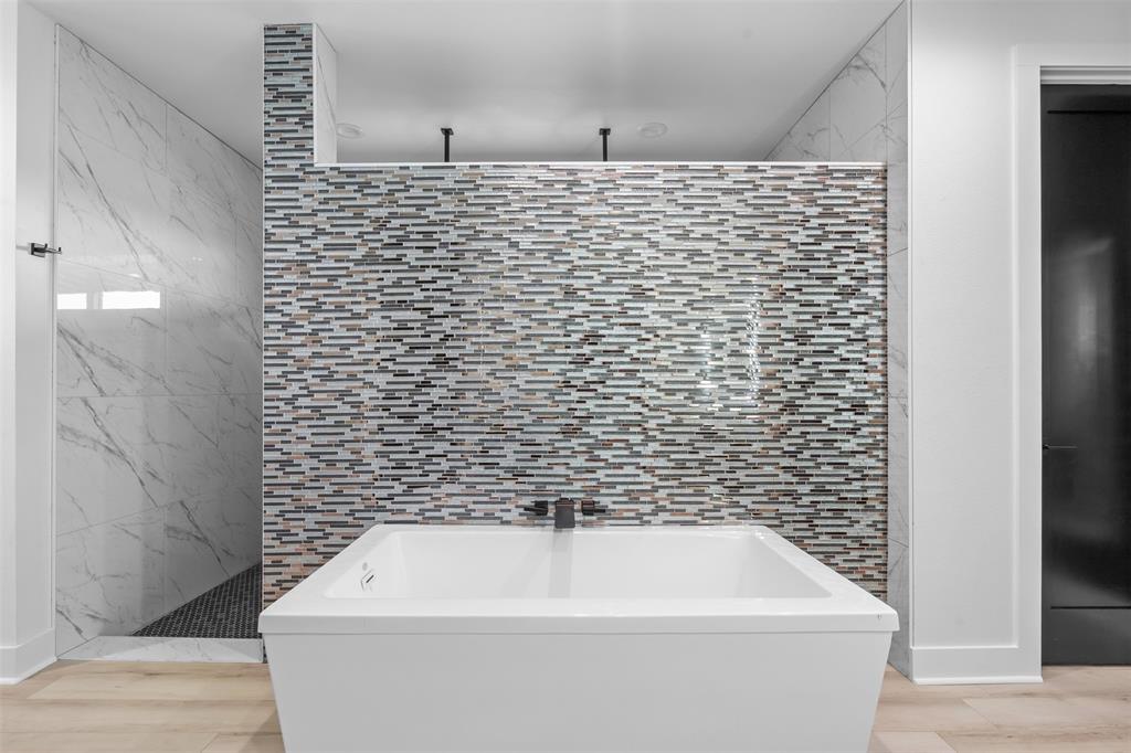 9700 Nix Road Tolar, TX 76476 - Photo 14 of 39 a bathroom with a white wall