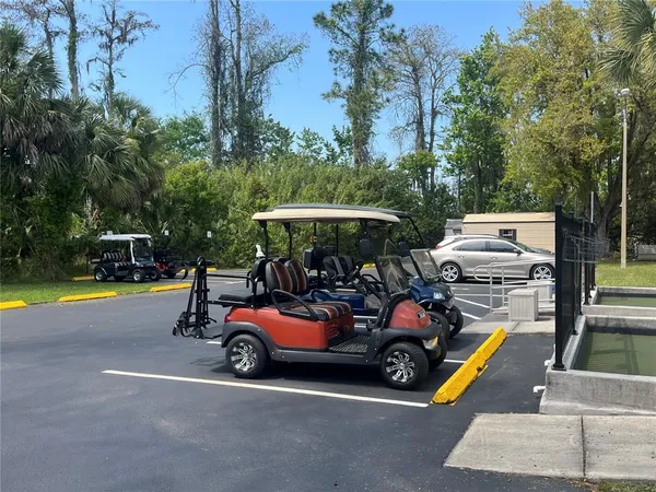 a view of outdoor space with swimming pool and furniture