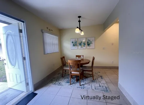 a view of a livingroom with furniture and window