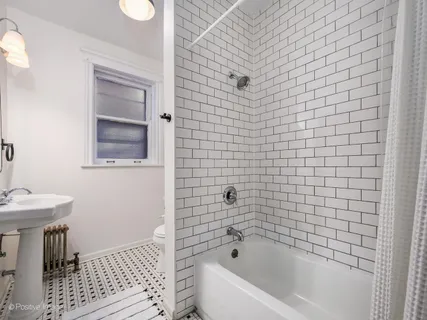 $299,000 | 1365 East 52nd Street, Unit 1E, Chicago, IL 60615