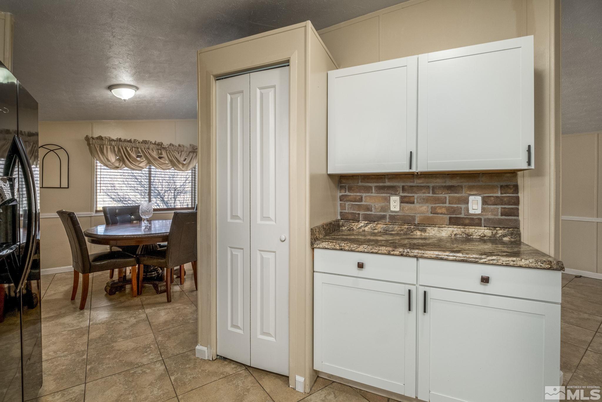 1670 Rockchuck Road Reno, NV 89506 - Photo 12 of 31 a view of kitchen with breakfast area
