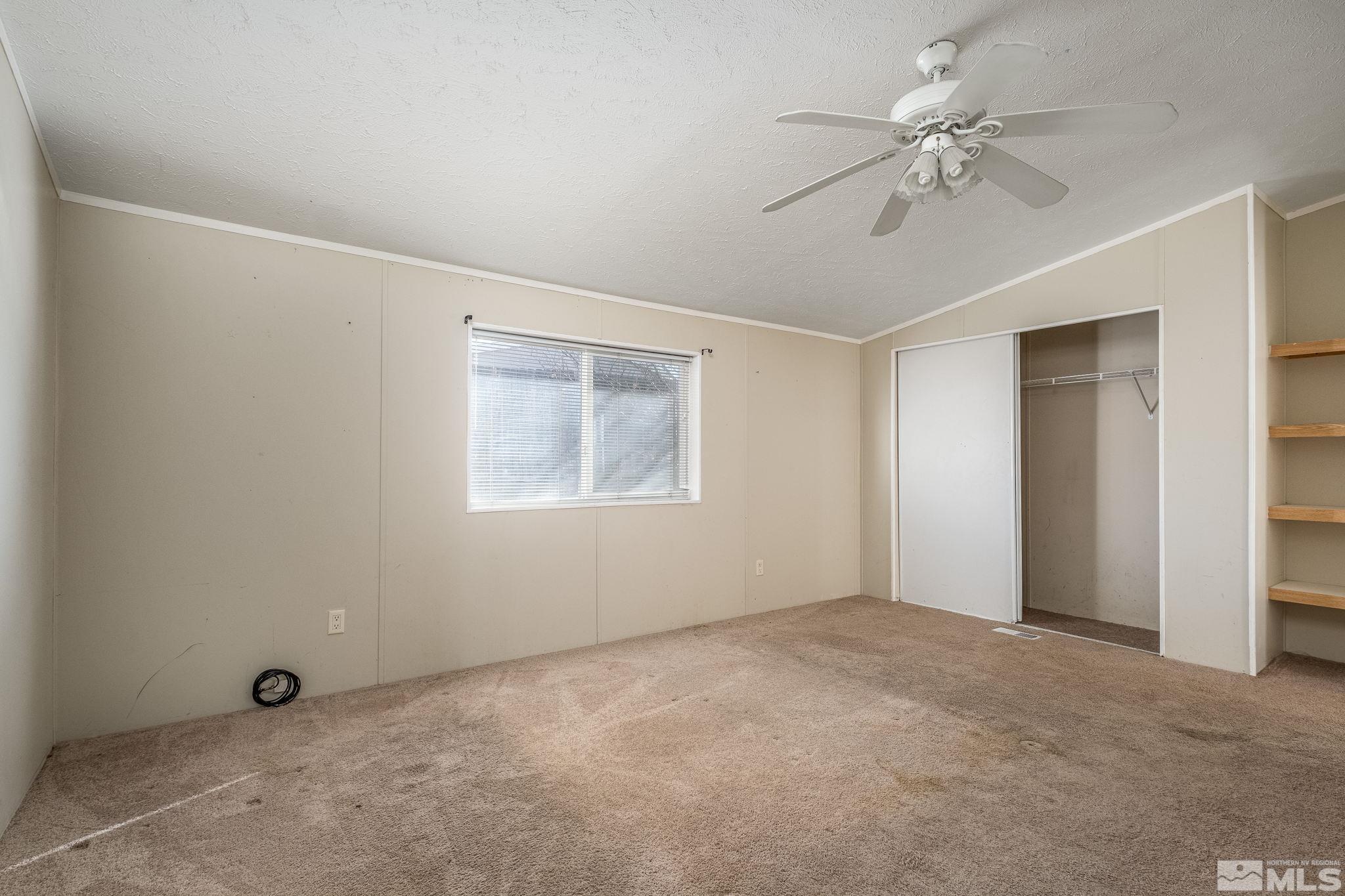 1670 Rockchuck Road Reno, NV 89506 - Photo 19 of 31 a view of an empty room with a window