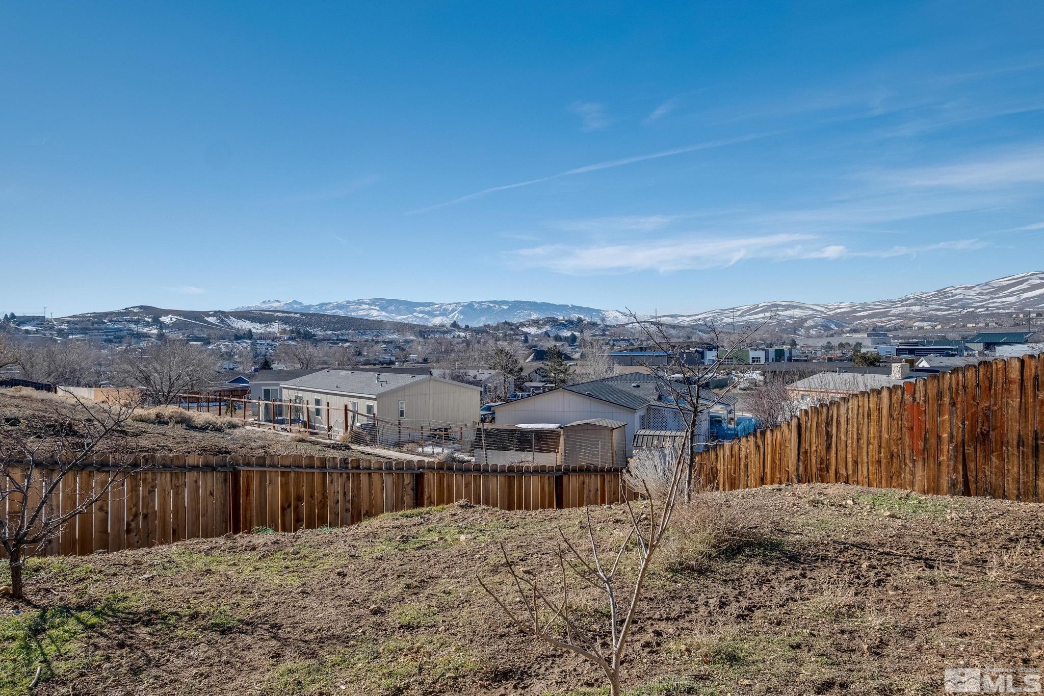 1670 Rockchuck Road Reno, NV 89506 - Photo 29 of 31 a view of a houses with a yard