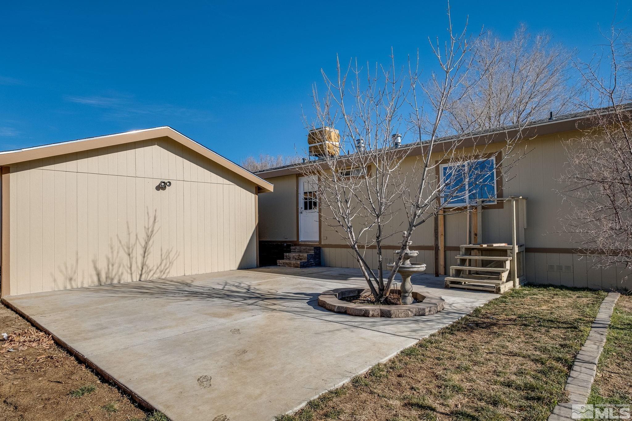 1670 Rockchuck Road Reno, NV 89506 - Photo 30 of 31 a view of a backyard with wooden fence