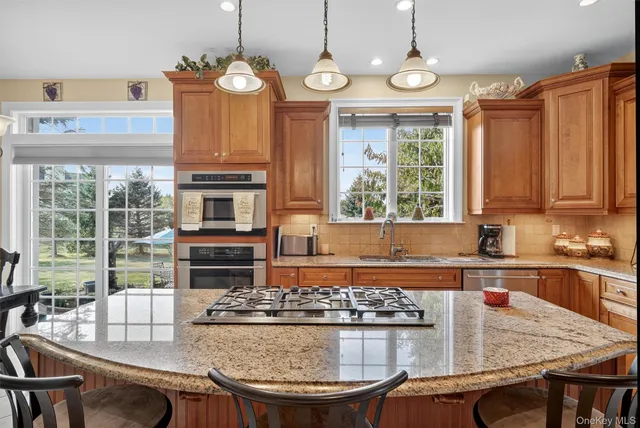 a kitchen with a table and chairs in it