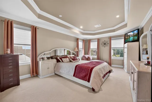 a bed room with a bed and a couch