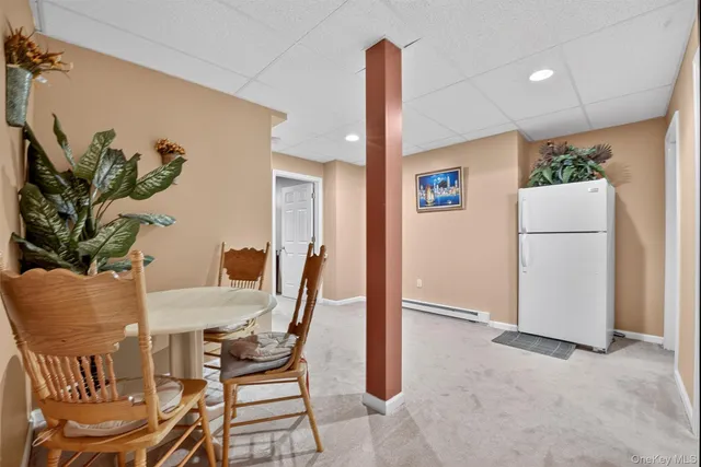 a bathroom with a sink double vanity and a mirror