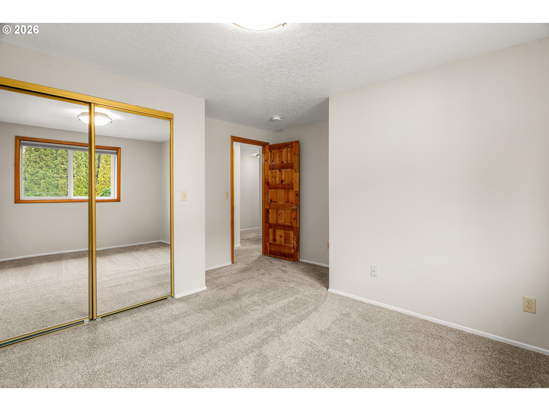 17839 Southwest Meadowbrook Way Beaverton, OR 97078 - Photo 21 of 45 a view of an empty room and window