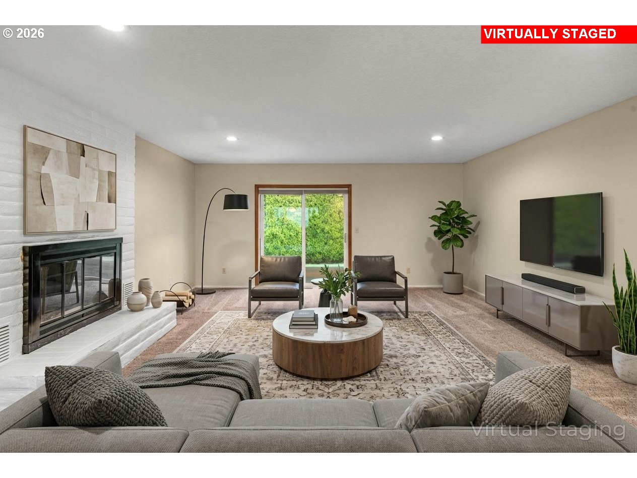 17839 Southwest Meadowbrook Way Beaverton, OR 97078 - Photo 5 of 45 a living room with furniture a window and a flat screen tv