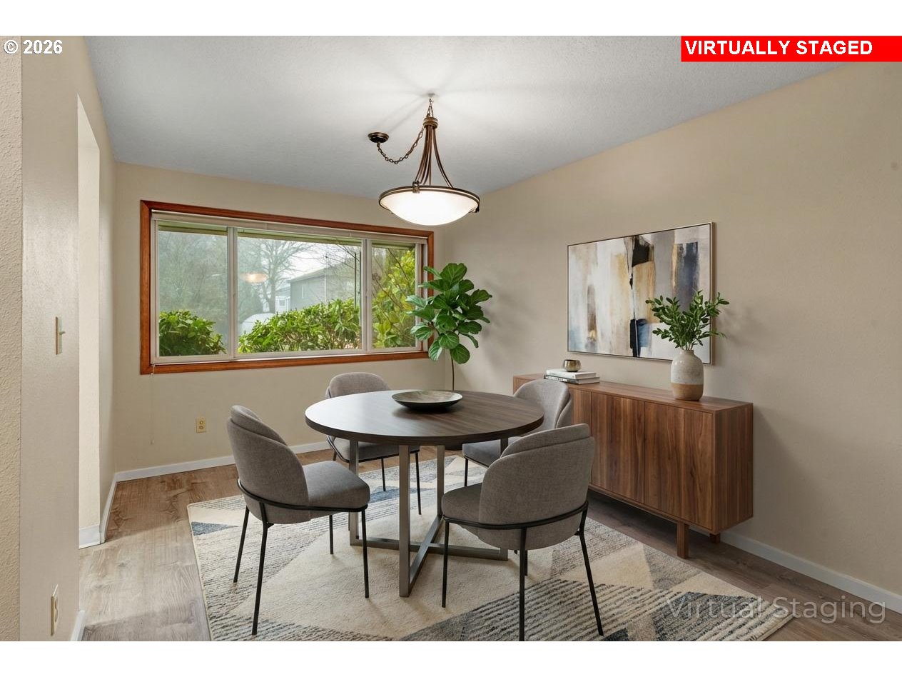 17839 Southwest Meadowbrook Way Beaverton, OR 97078 - Photo 8 of 45 a view of a dining room with furniture window and outside view