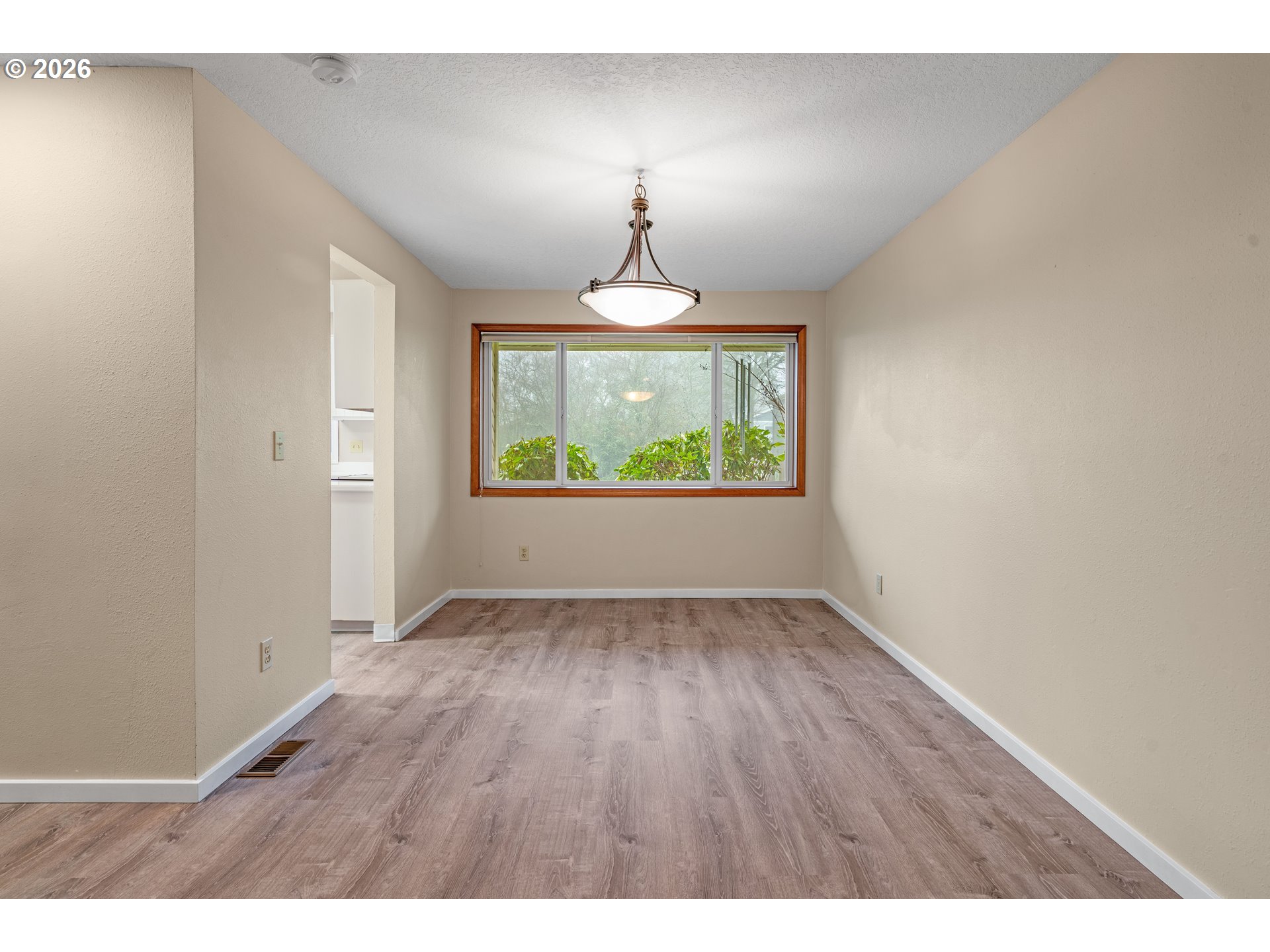 17839 Southwest Meadowbrook Way Beaverton, OR 97078 - Photo 9 of 45 a window in an empty room with a window