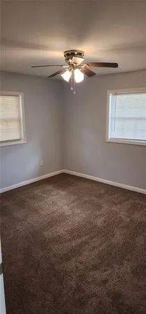 a view of a livingroom with a fan
