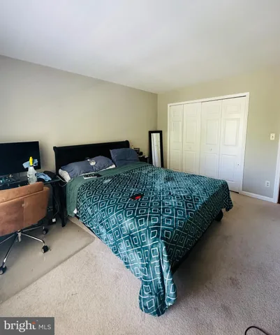 a room with furniture and air hockey table