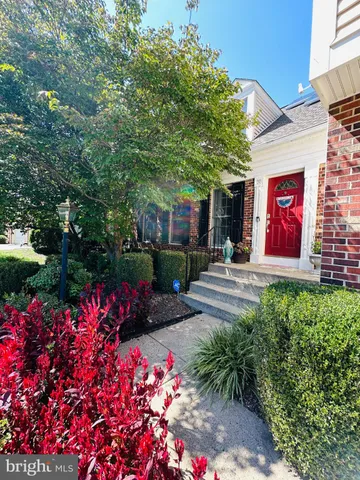 a front view of a house with yard