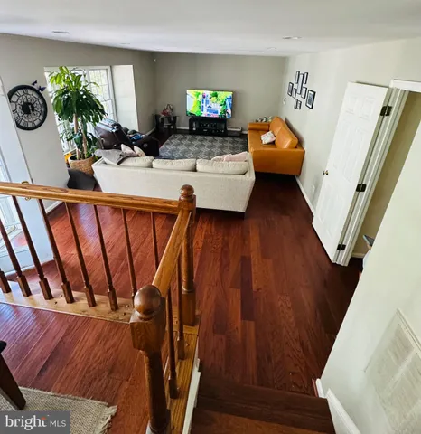 a view of entryway with wooden floor