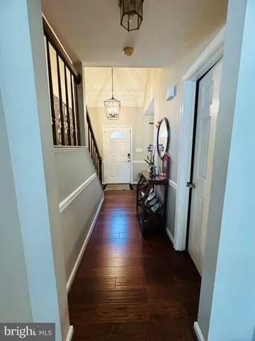 an aerial view of a house with swimming pool and outdoor space