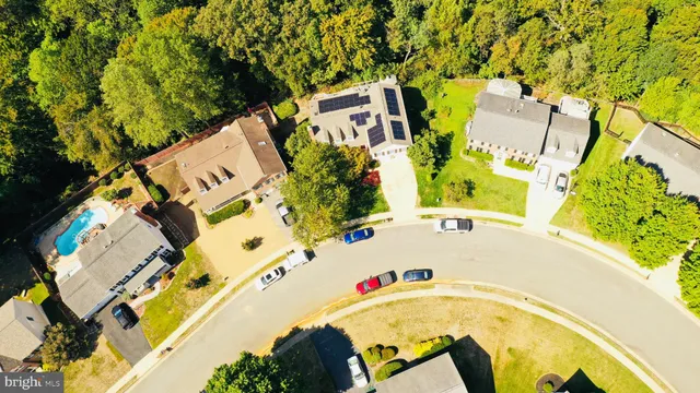 an aerial view of a swimming pool
