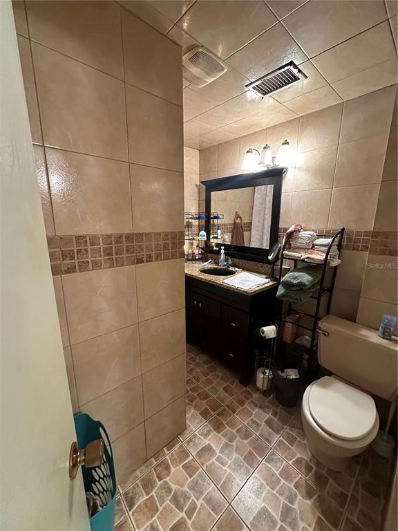 1326 Northeast Forrest Avenue Arcadia, FL 34266 - Photo 11 of 26 a bathroom with a sink toilet and shower