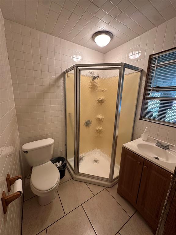 1326 Northeast Forrest Avenue Arcadia, FL 34266 - Photo 15 of 26 a bathroom with a granite countertop sink toilet and shower