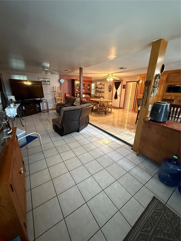 1326 Northeast Forrest Avenue Arcadia, FL 34266 - Photo 2 of 26 a living room with furniture and a flat screen tv