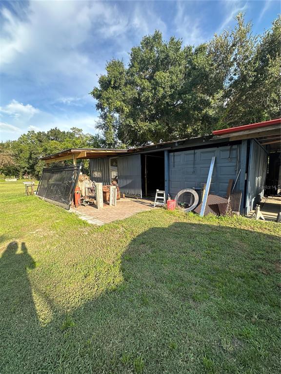 1326 Northeast Forrest Avenue Arcadia, FL 34266 - Photo 21 of 26 a view of a swimming pool with a patio